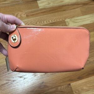 NWT Jen & Co. coral color clutch